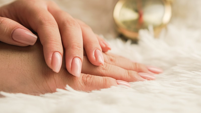 Close up of nude and blush toned nails